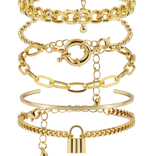 LAYERED GOLD BRACELETS