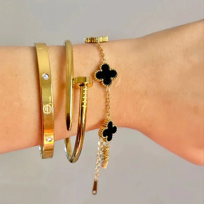 SET OF 4 BLACK BRACELETS WITH GOLD EDITION