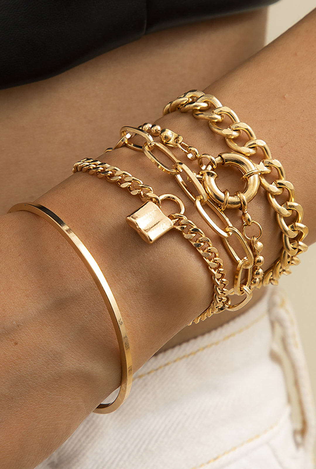 LAYERED GOLD BRACELETS