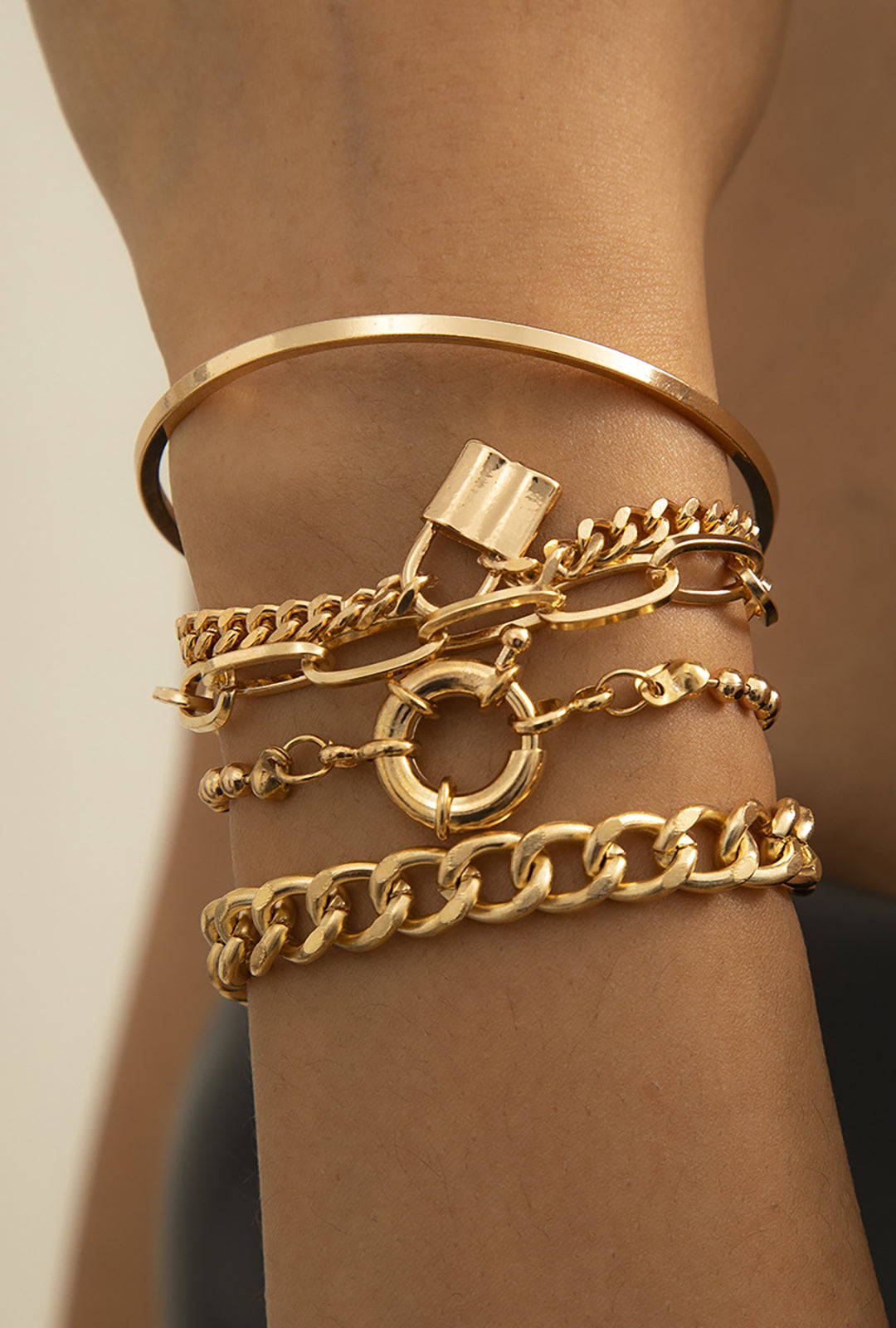 LAYERED GOLD BRACELETS